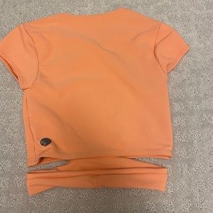 orange athletic and dance top